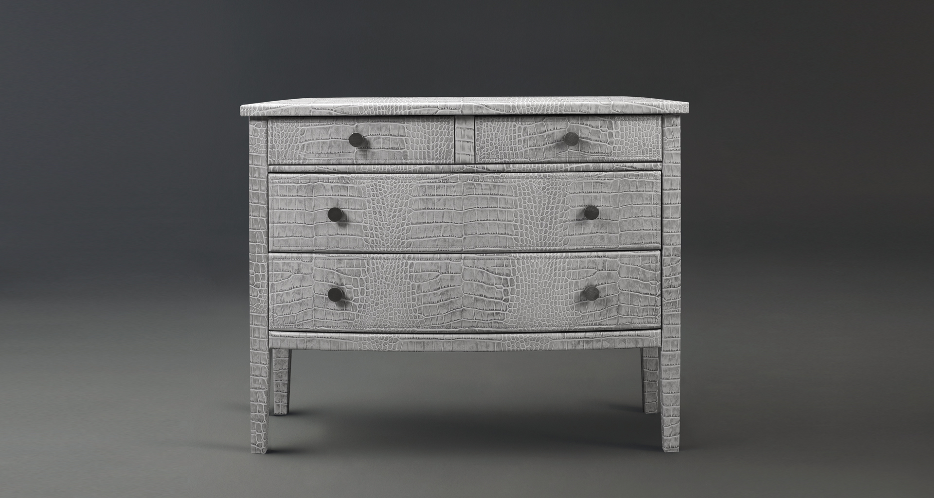 Cassettiera '700 is a wooden chest of drawers covered in leather or galuchat with bronze knobs, from Promemoria's catalogue | Promemoria