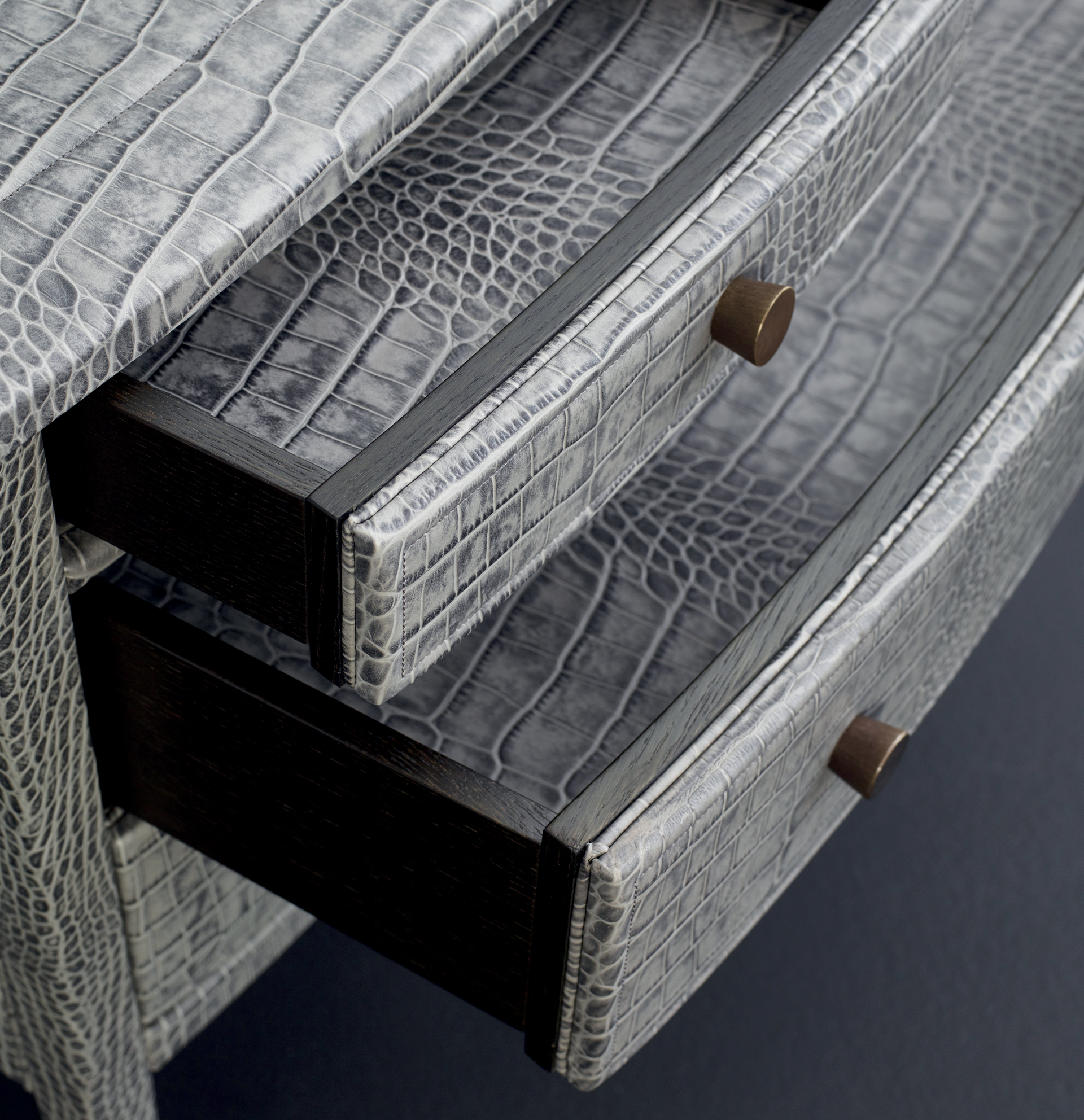 Cassettiera '700 is a wooden chest of drawers covered in leather or galuchat with bronze knobs, from Promemoria's catalogue | Promemoria
