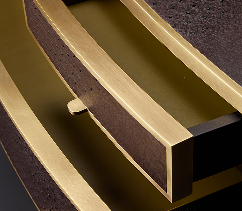 Cassettiera '700 is a wooden chest of drawers covered in leather or galuchat with bronze knobs, from Promemoria's catalogue | Promemoria