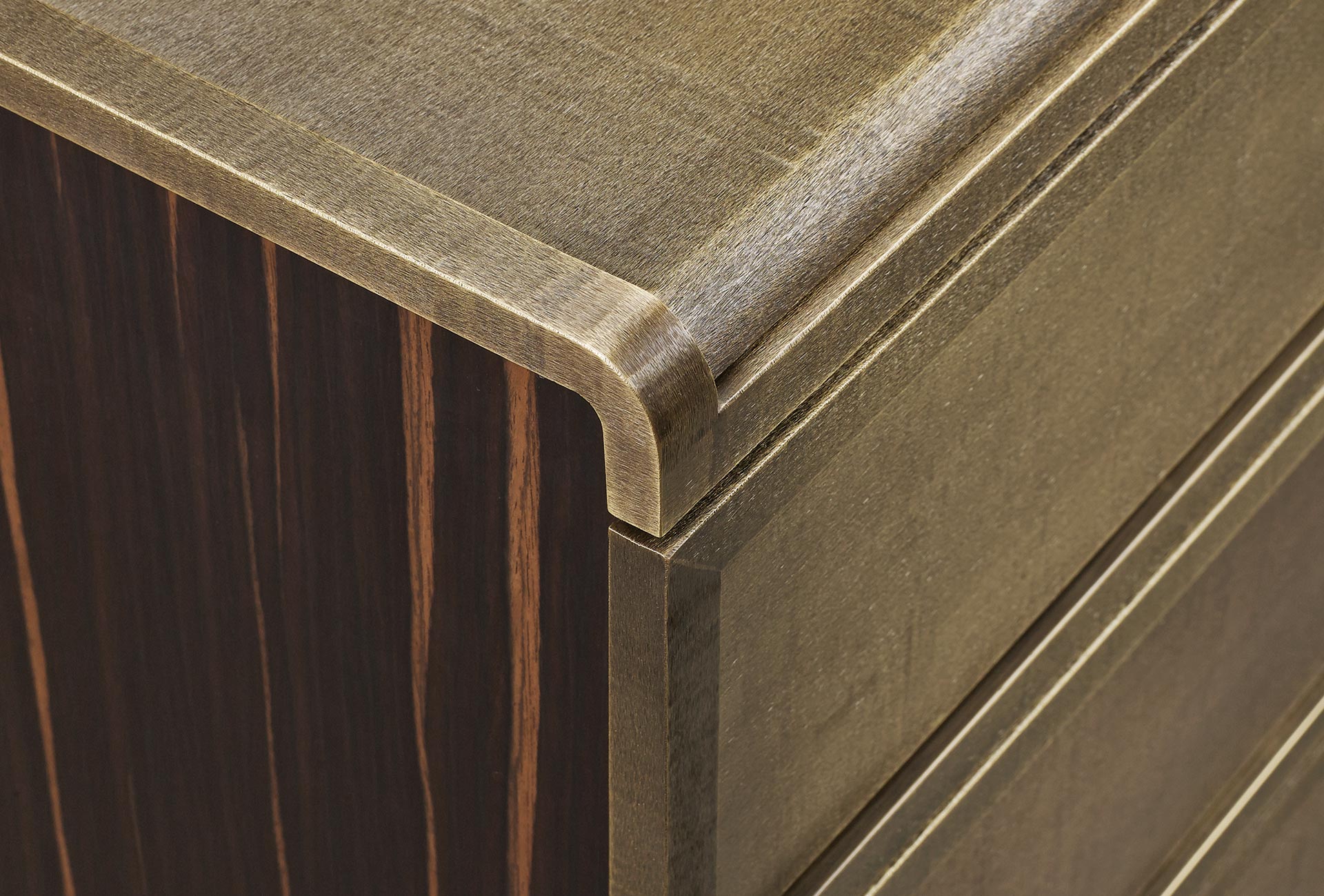 Orione is a wooden chest of drawers covered in leather, from Promemoria's catalogue | Promemoria