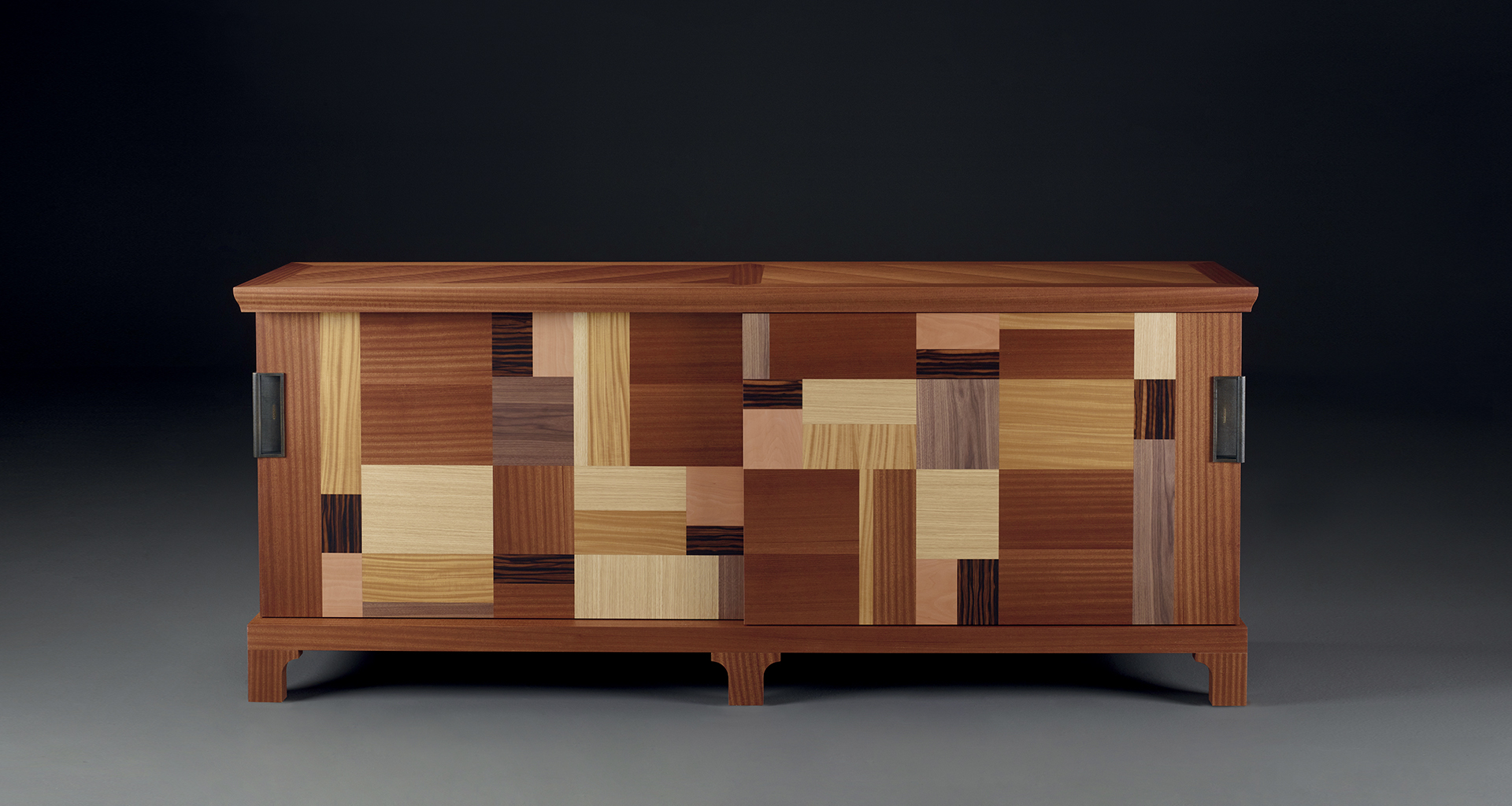 Oolong, a low wooden cabinet with sliding doors, patchwork inlay from Promemoria's catalogue | Promemoria