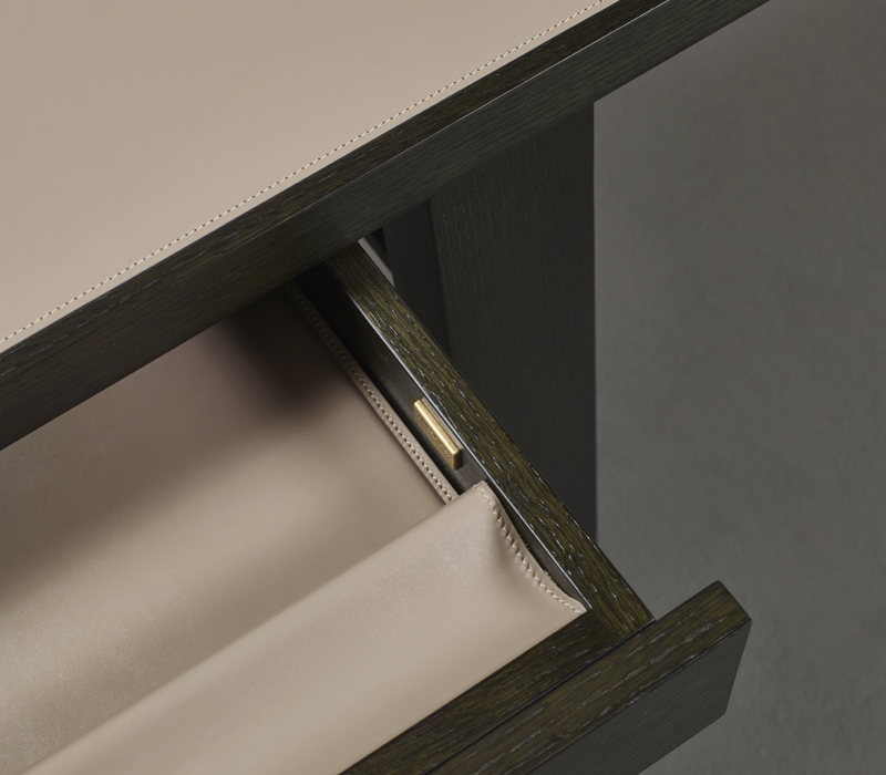 Detail of Isaac, a compact writing desk with wooden structure and drawers that belongs to the Amaranthine Tales collection of Promemoria | Promemoria