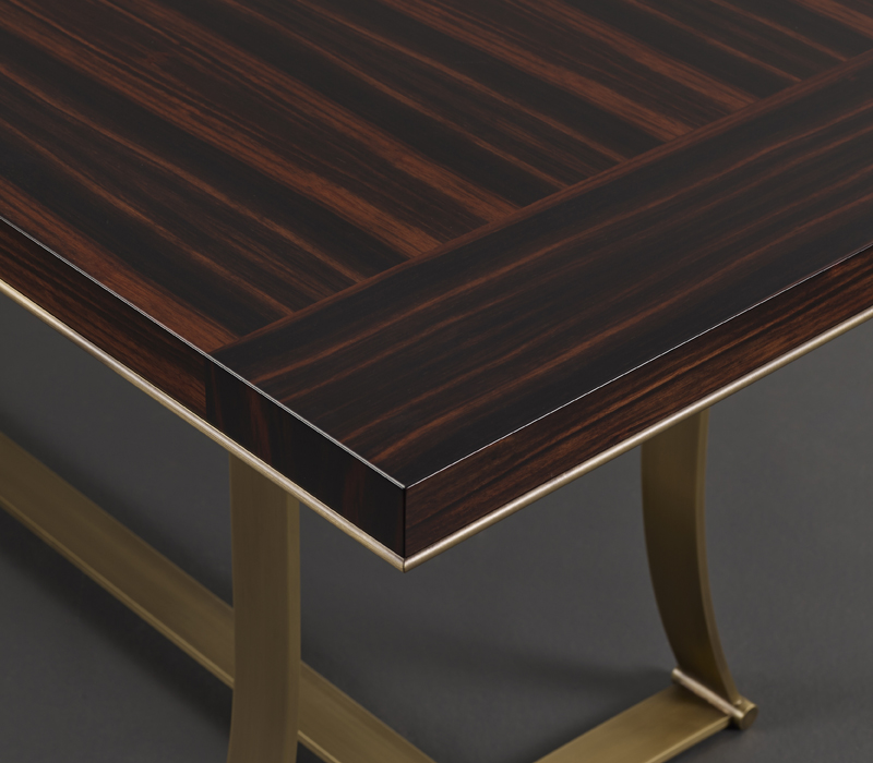Victor is a table with bronze structure and a writing desk in bronze and morado wood from the Promemoria's catalogue | Promemoria