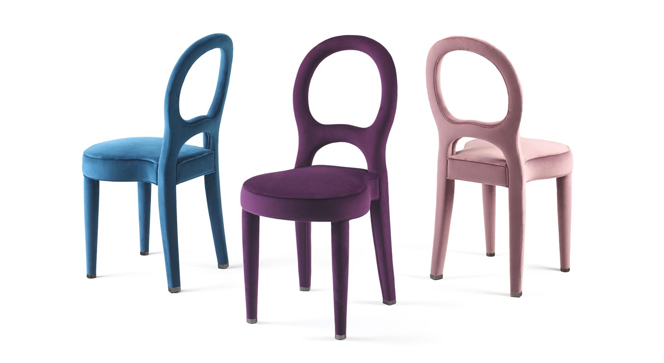 https://promemoria.freetls.fastly.net/mediaBilou%20Bilou%20is%20a%20dining%20chair%20covered%20in%20velvet%20and%20linen%20or%20nappa%20leather%20available%20in%20different%20colors%20and%20in%20the%20versions%20standard,%20large%20and%20kids.%20Bilou%20Bilou%20is%20the%20most%20iconic%20dining%20chair%20from%20Promemoria's%20catalogue%20|%20Promemoria