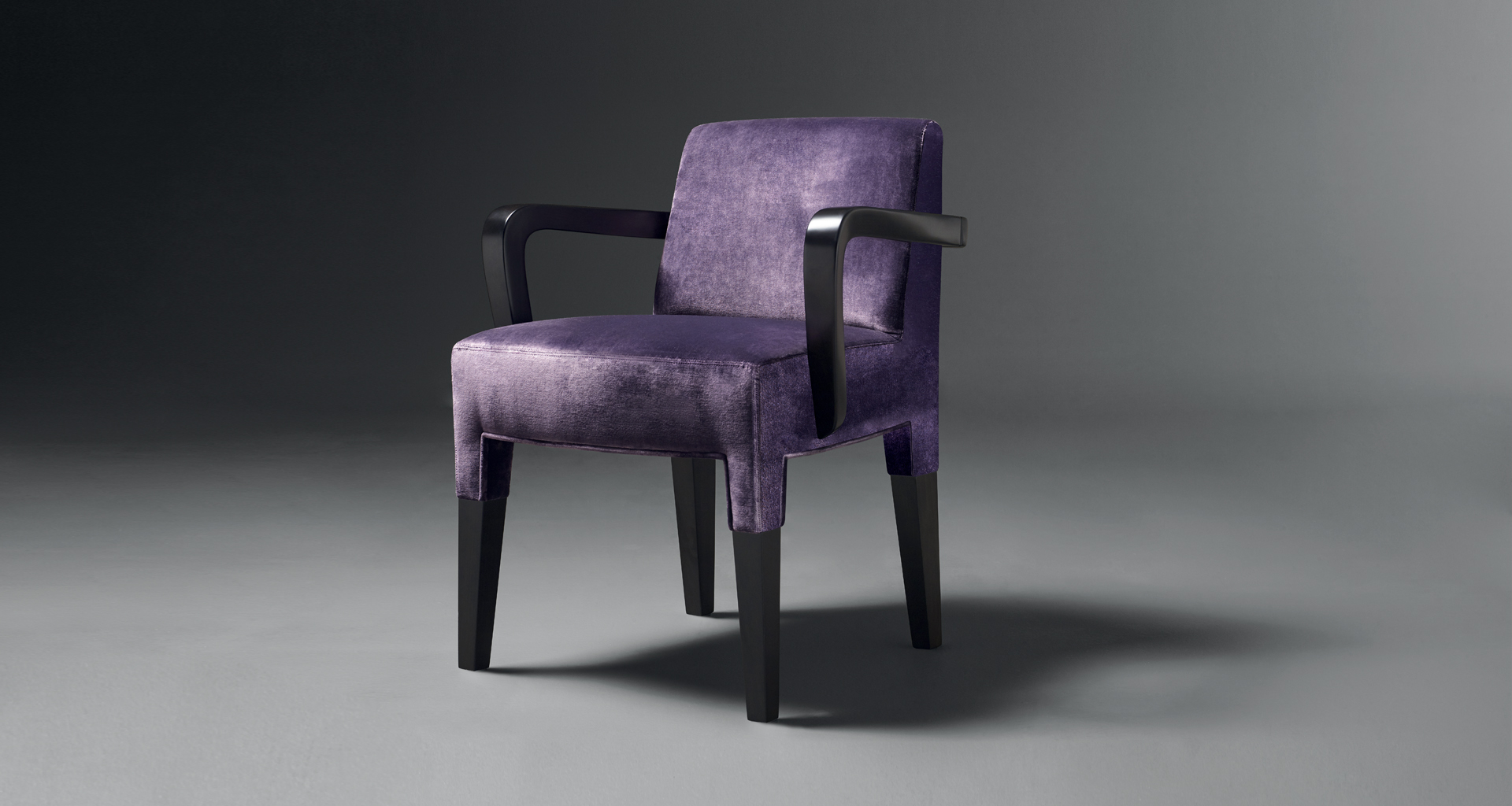 Brigitta Short is a wooden dining chair covered in fabric or leather, with a handle on the backrest, from Promemoria's catalogue | Promemoria