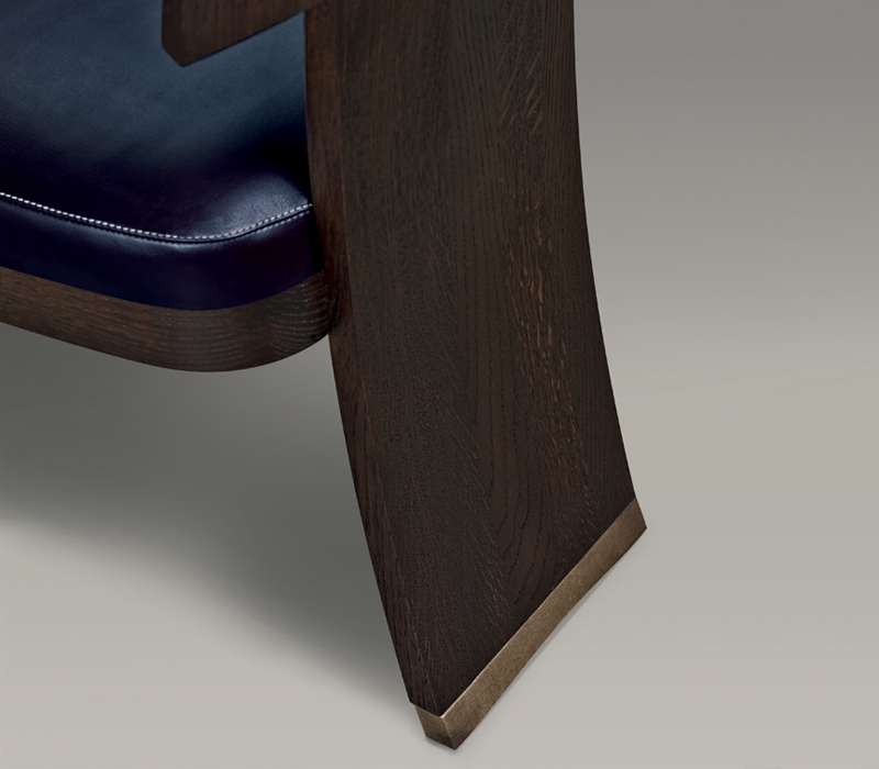Bronze feet detail of DC Chair, a wooden dining chair with leather seat and back, from Promemoria's The London Collection | Promemoria