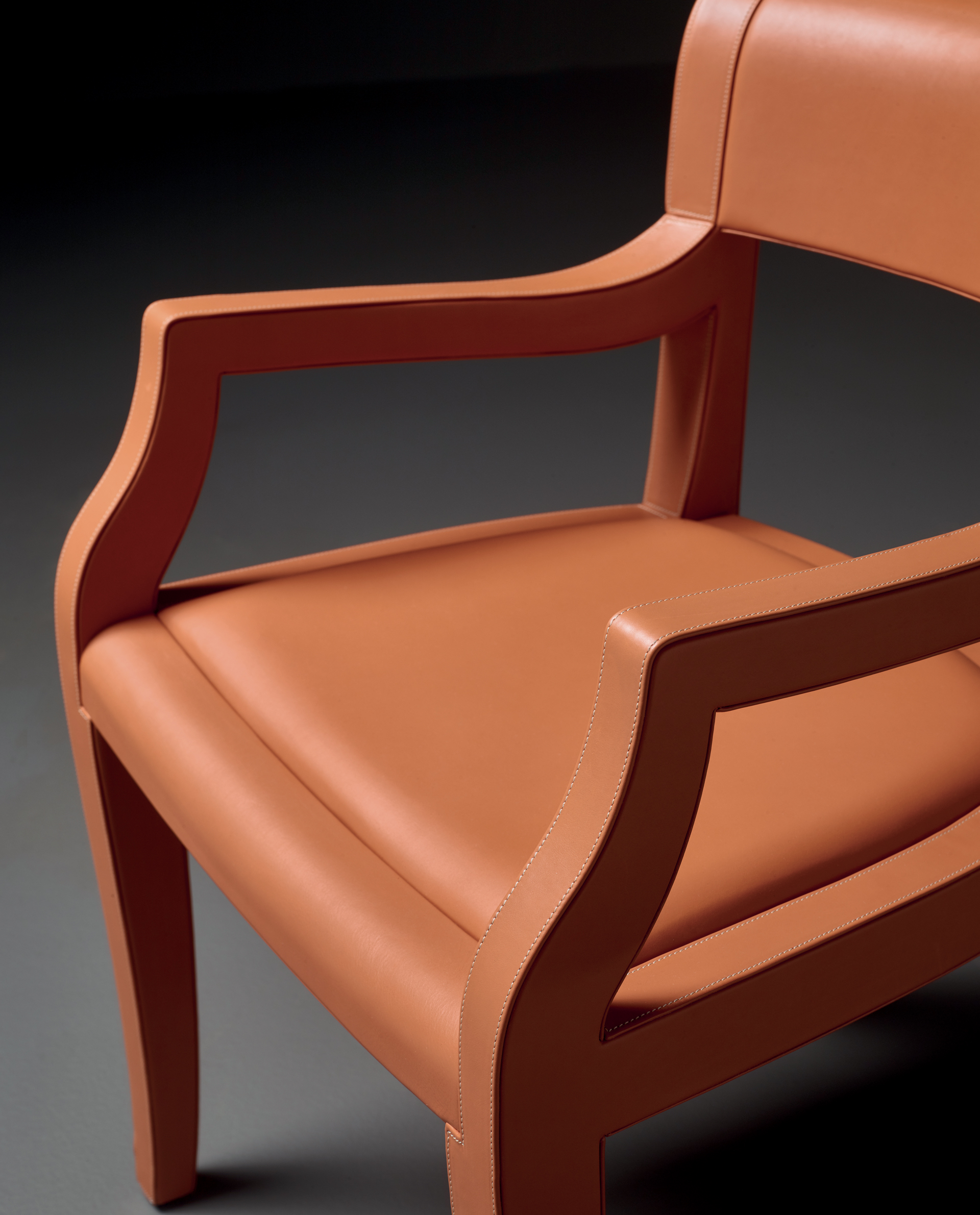 Eloise is a wooden dining chair with leather seat, available with or without armrests  from Promemoria's catalogue | Promemoria