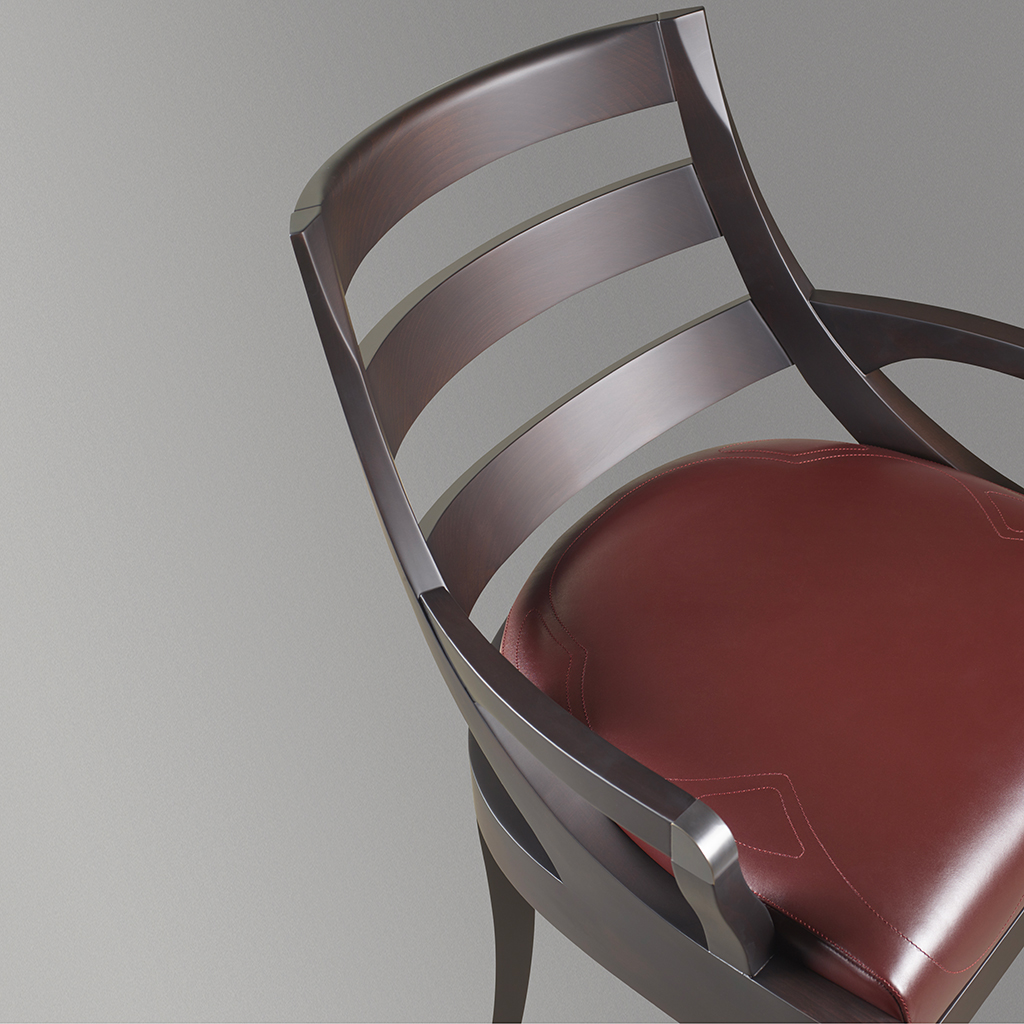 Judith is a wooden dining chair with a bronze detail on the armrest, from Promemoria's catalogue | Promemoria
