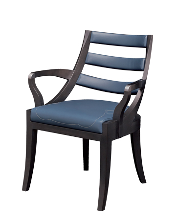 Judith is a wooden dining chair with a bronze detail on the armrest, from Promemoria's catalogue | Promemoria
