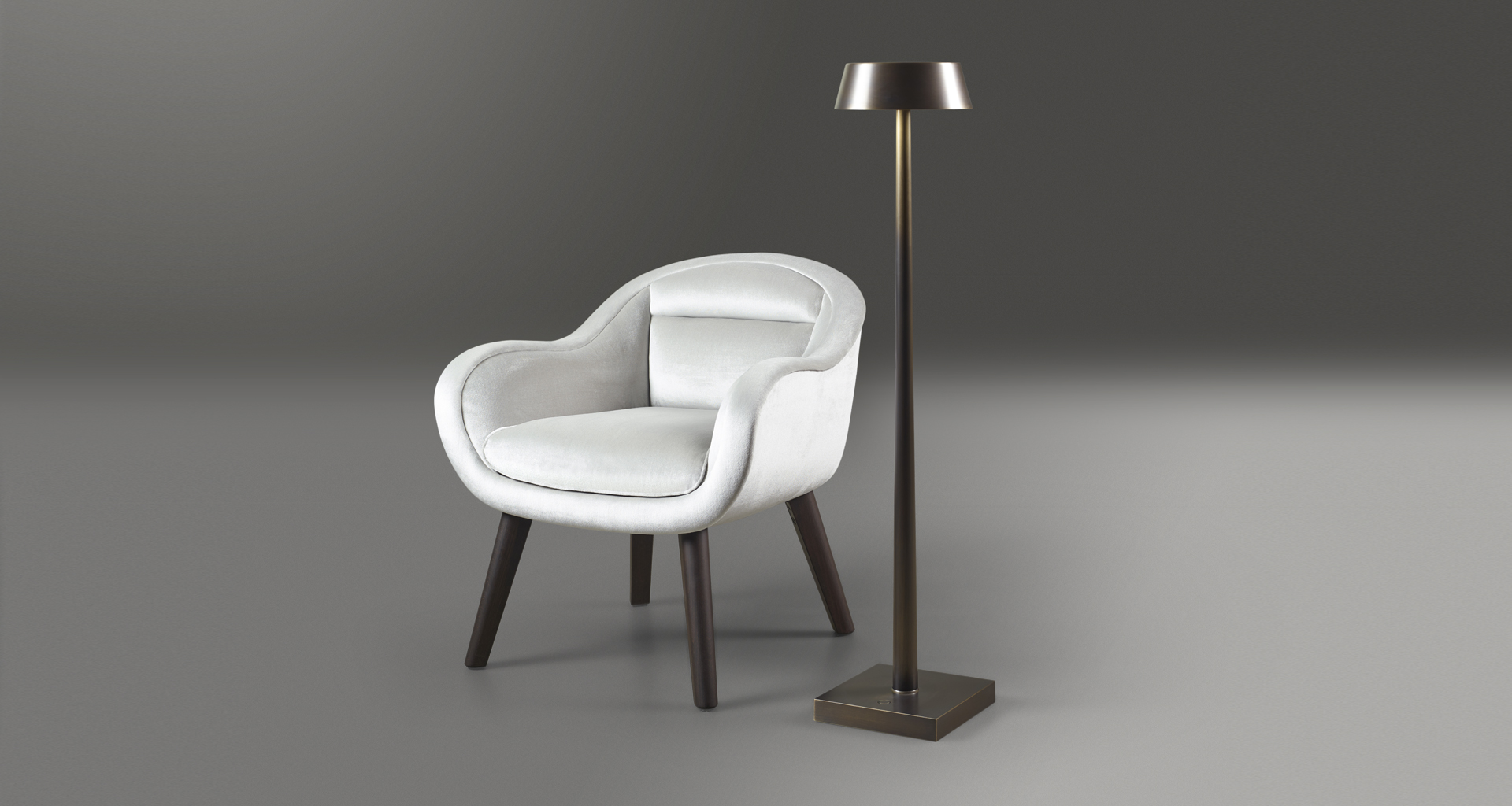 Vittoria is a wooden chair covered in fabric or leather with a bronze handle on the back, from Promemoria's catalogue | Promemoria