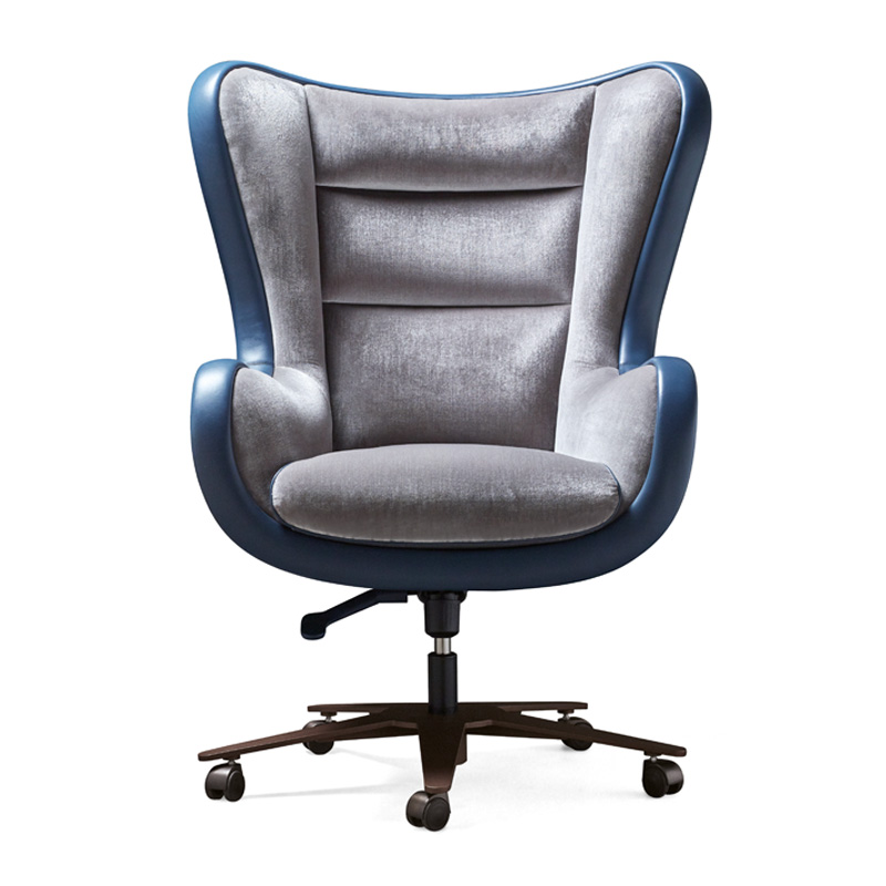 Butterfly is an office armchair covered in leather and fabric, available with a pouf, from Promemoria's catalogue | Promemoria