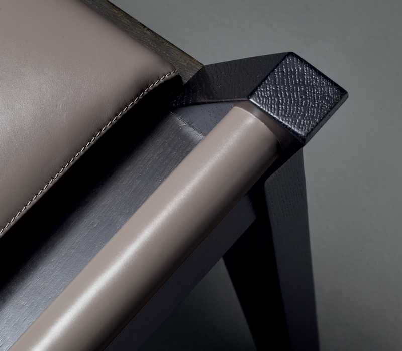 Detail of Jean, a wooden stool, leather seat from Promemoria's Amaranthine Tales collection | Promemoria