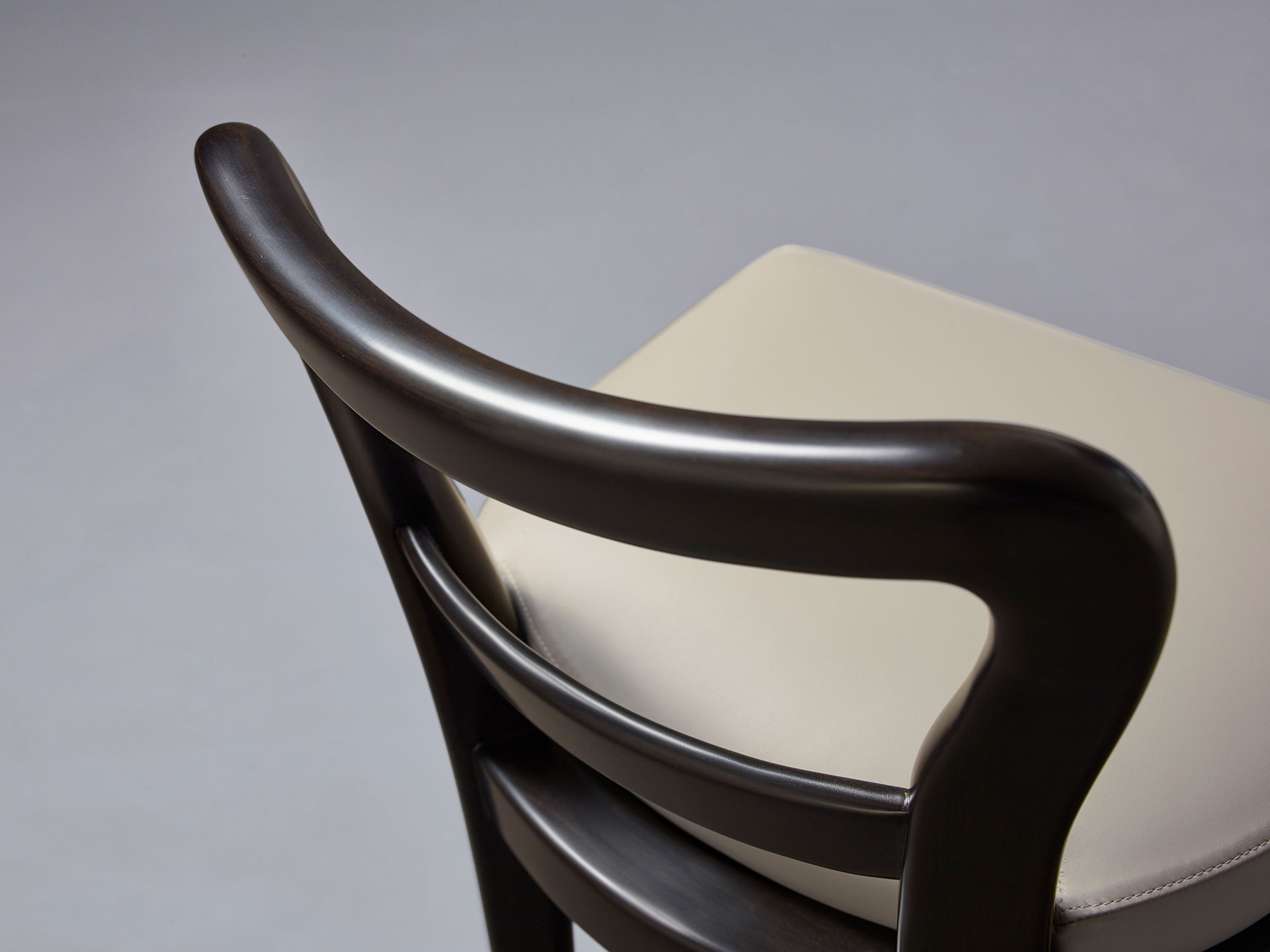 Sofia is a wooden stool with seat covered in fabric or leather, from Promemoria's catalogue | Promemoria