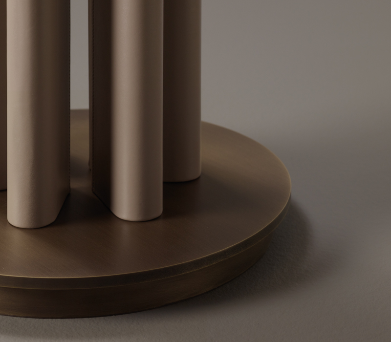 Bronze base detail of Clori, a floor LED lamp with leather or wooden structure, bronze details and linen, cotton or silk with handmade edge, from Promemoria's Amaranthine Tales collection | Promemoria