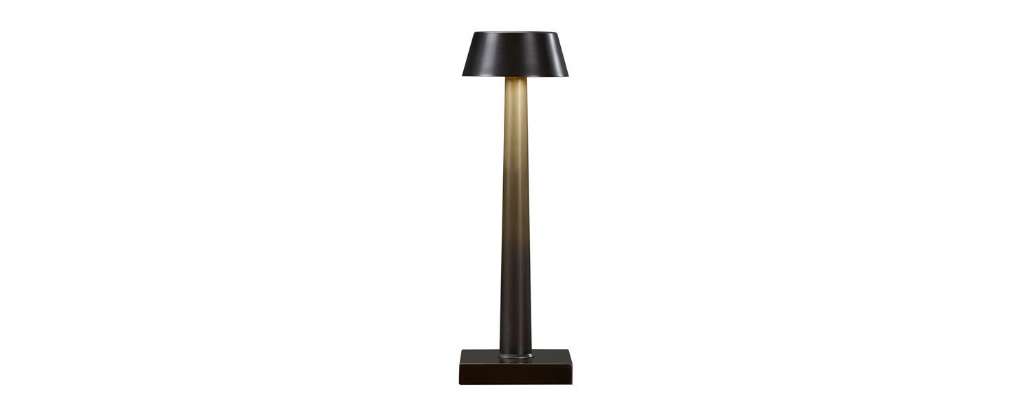 https://promemoria.freetls.fastly.net/mediaFiammetta%20is%20a%20portable%20table%20LED%20lamp%20with%20bronze%20structure%20and%20touch%20switch,%20from%20Promemoria's%20catalogue%20|%20Promemoria