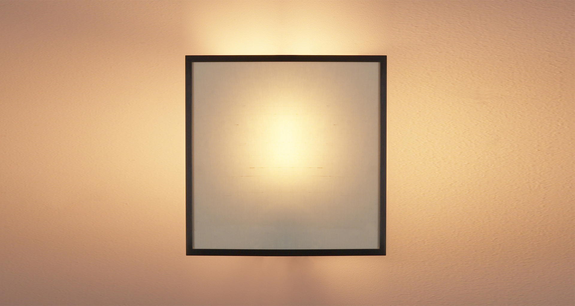 Teresa is a modular bronze wall lamp with a glass diffuser with linen, cotton or silk insert, from Promemoria's catalogue | Promemoria