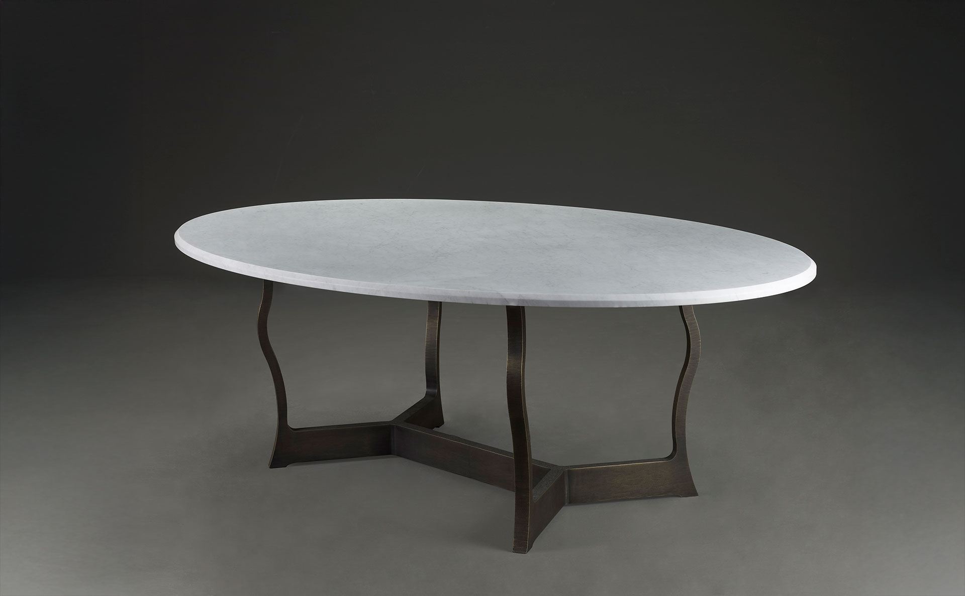 Erasmo is an outdoor dining table with bronze base and marble top, from Promemoria's outdoor catalogue | Promemoria