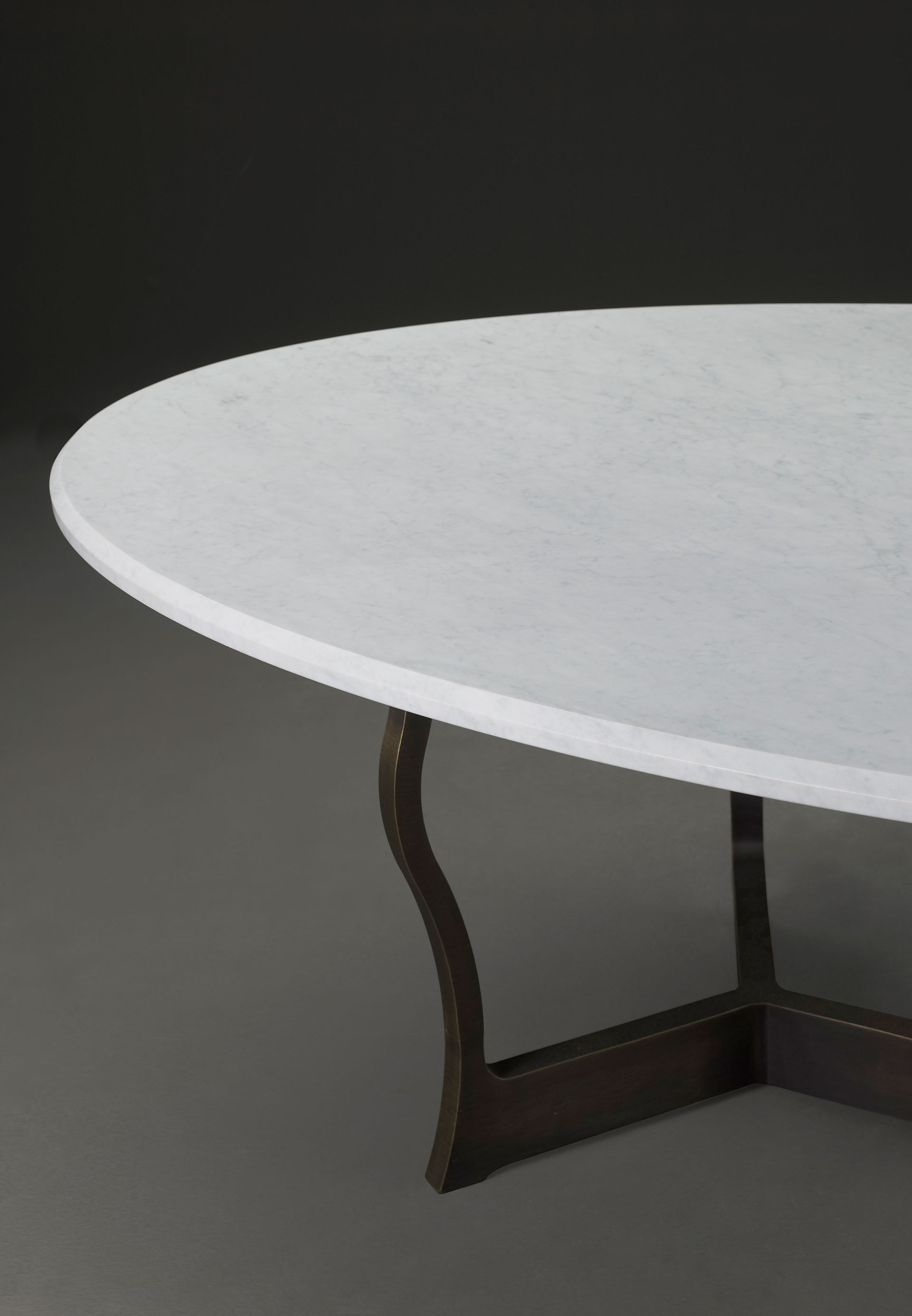 Erasmo is an outdoor dining table with bronze base and marble top, from Promemoria's outdoor catalogue | Promemoria