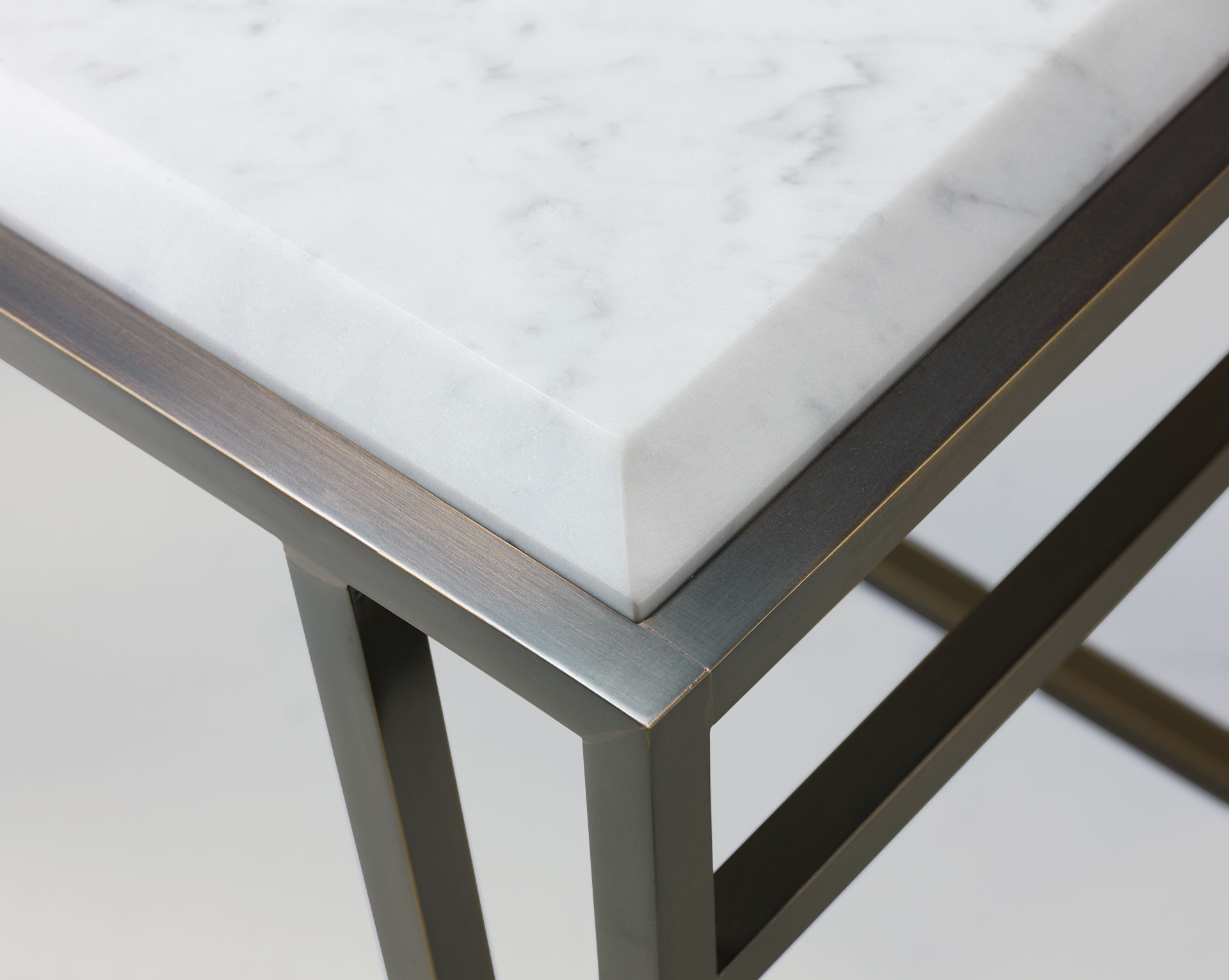 Cernobbio is an outdoor small table with bronze base and marble top, from Promemoria's outdoor catalogue | Promemoria