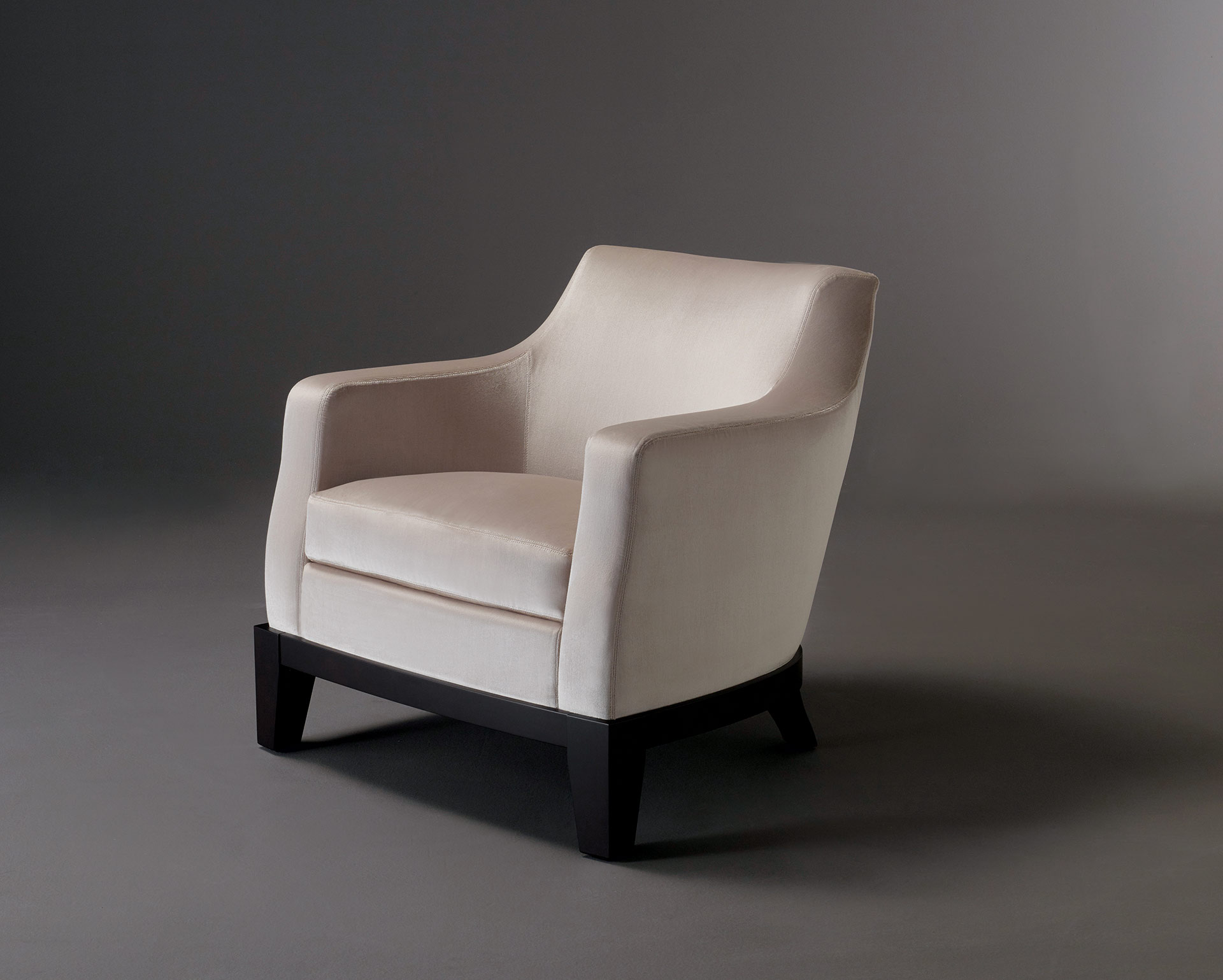 Aziza is a wooden armchair covered in fabric or leather, from Promemoria's catalogue | Promemoria