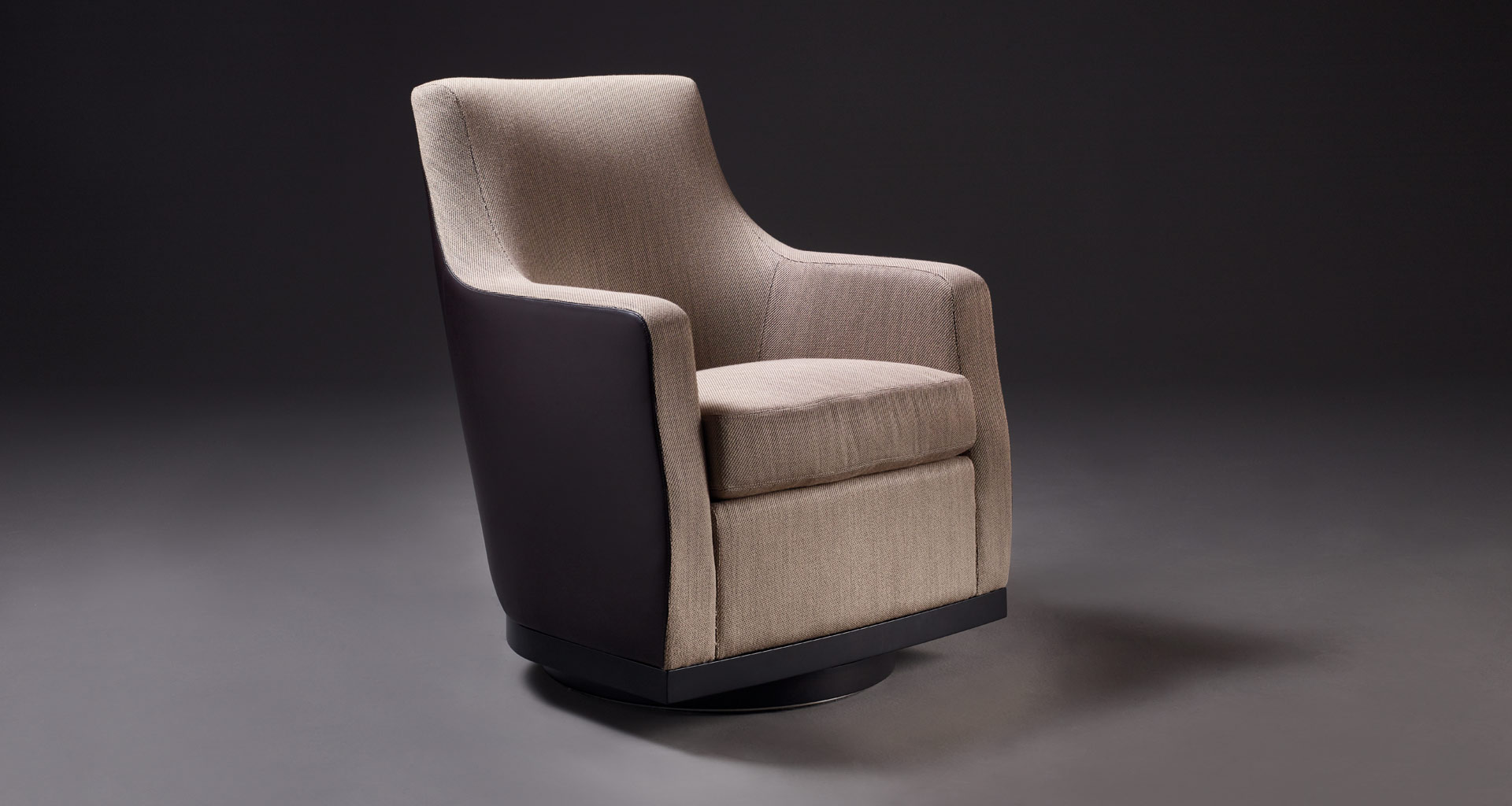 Aziza is a wooden armchair covered in fabric or leather, from Promemoria's catalogue | Promemoria