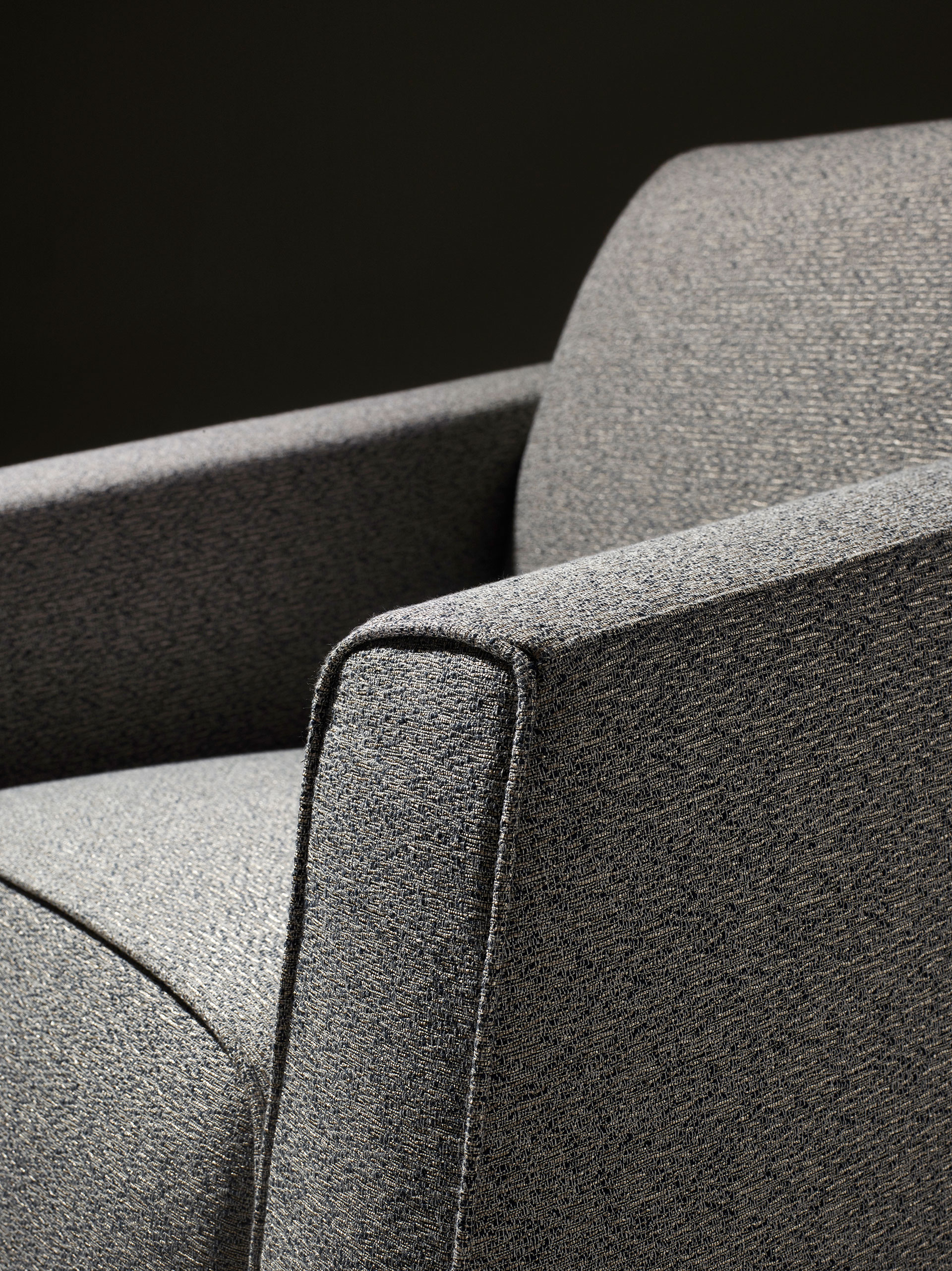 DimensionsMartini Nini, an armchair with fabric or leather covering and seat cushions and bronze feet, f of Martini Nini, an armchair with fabric or leather covering and seat cushions and bronze feet, from Promemoria's Indigo Tales collection | Promemoria