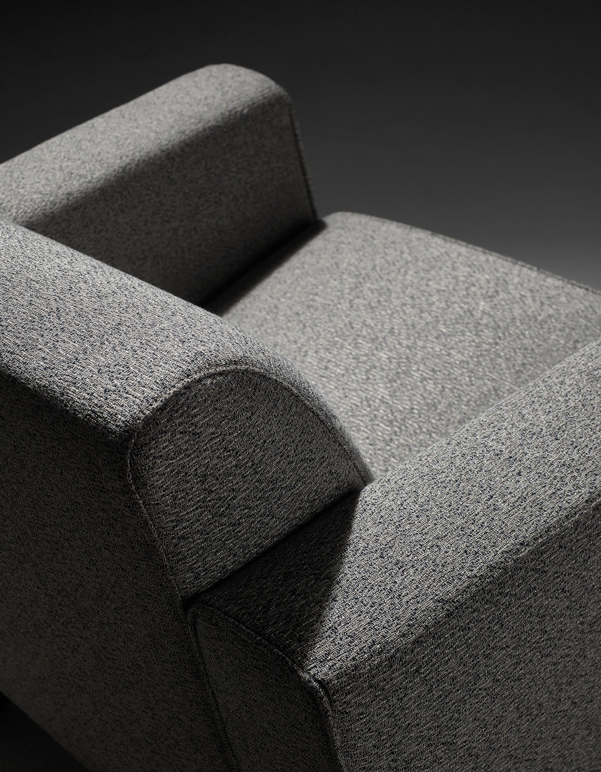 DimenMartini Nini, an armchair with fabric or leather covering and seat cushions and bronze feet, fsions of Martini Nini, an armchair with fabric or leather covering and seat cushions and bronze feet, from Promemoria's Indigo Tales collection | Promemoria