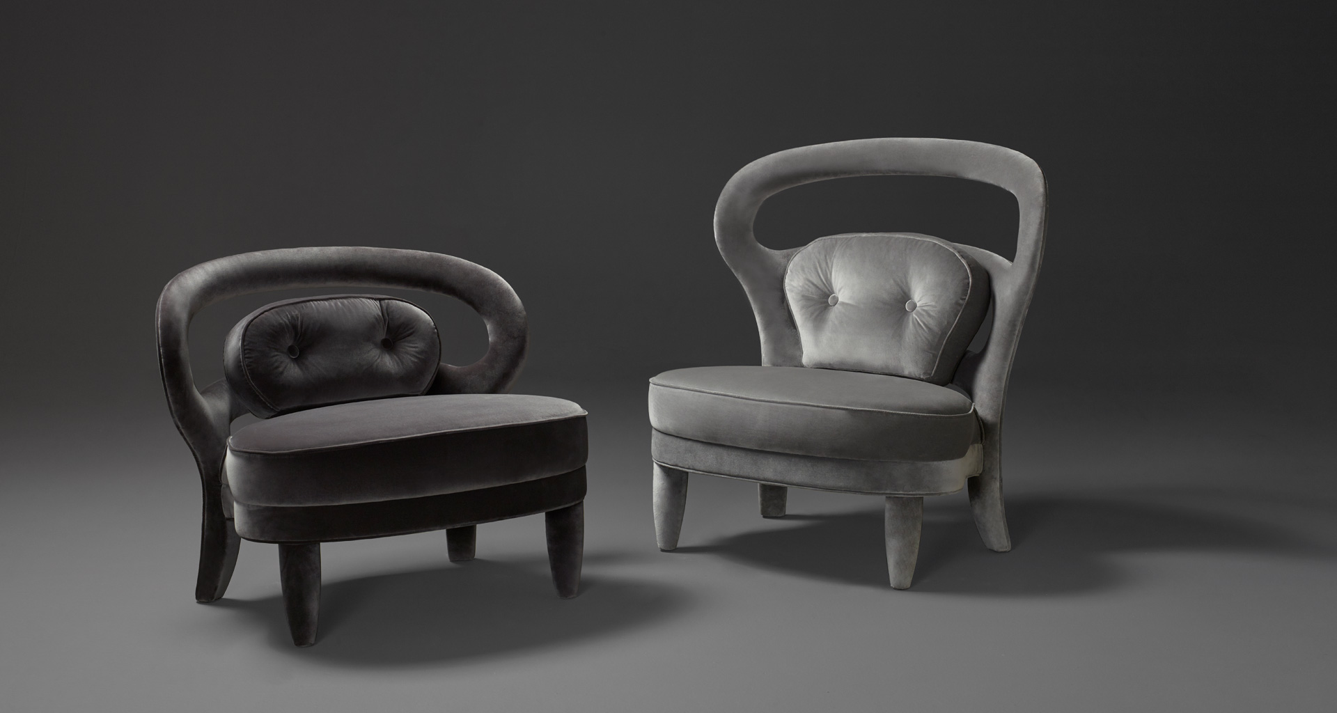 Nina is an armchair covered in fabric or leather with high or low back, from Promemoria's catalogue | Promemoria