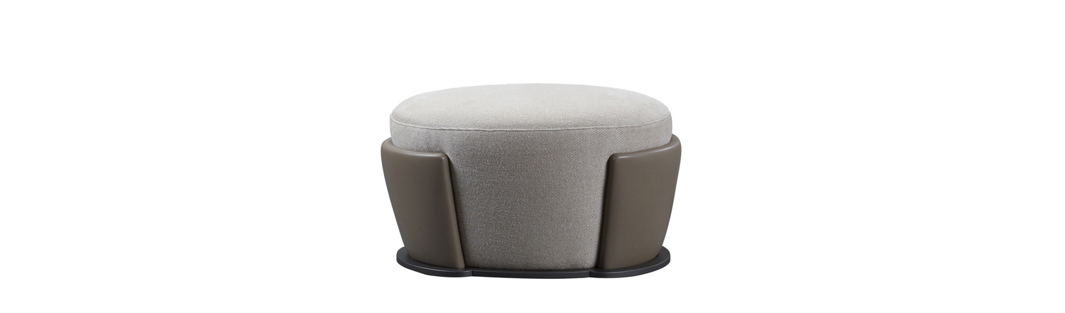https://promemoria.freetls.fastly.net/mediaRosaspina%20is%20a%20pouf%20covered%20in%20fabric%20and%20leather%20and%20a%20metal%20base,%20from%20Promemoria's%20catalogue%20|%20Promemoria
