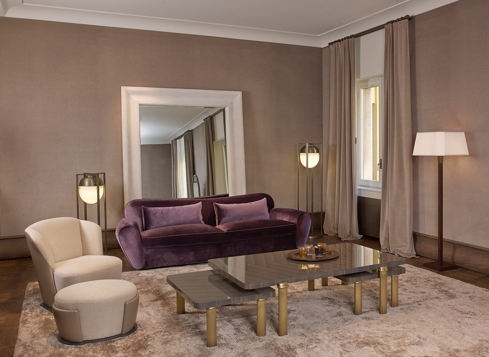 Artù is a sofa covered in fabric with bronze feet, from Promemoria's catalogue | Promemoria