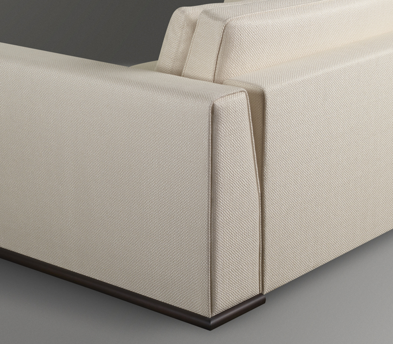 Ulderico is a wooden sofa covered in fabric, from Promemoria's catalogue | Promemoria