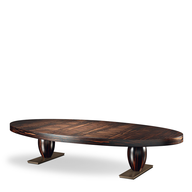 Bassano is an elliptical or rectangular bronze coffee table, covered in leather or inlaid top, from Promemoria's catalogue | Promemoria