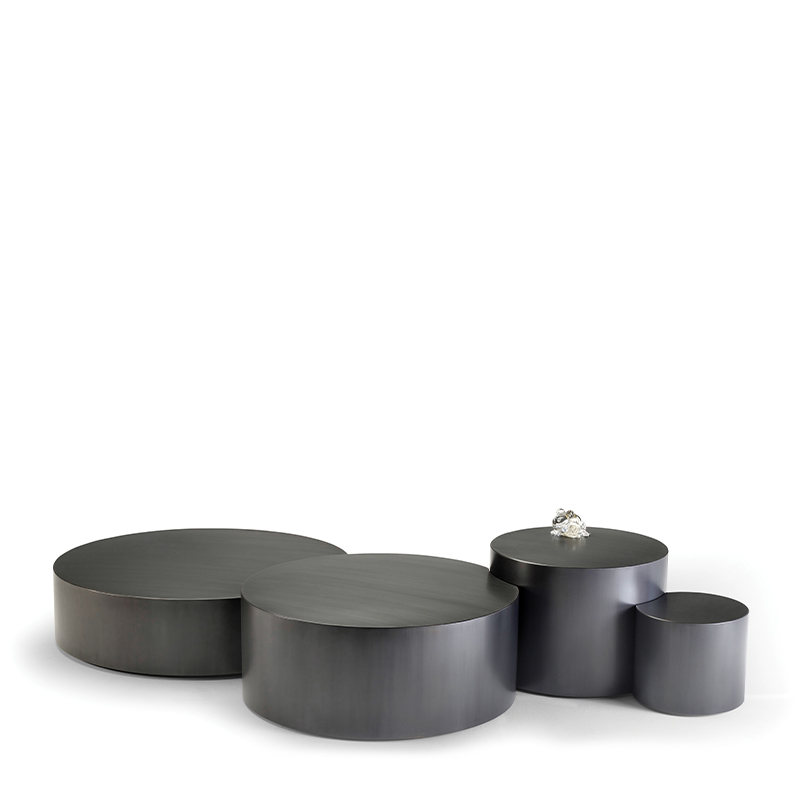 Edon is a bronze coffee table, with four units embedded, from Promemoria's Indigo Tales collection | Promemoria