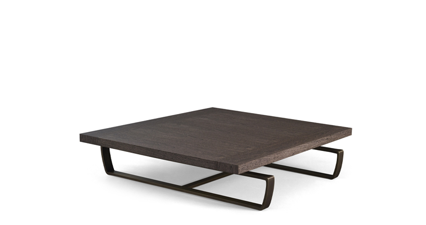 Saint Moritz is a coffee table with wooden top and bronze base, from Promemoria's catalogue | Promemoria