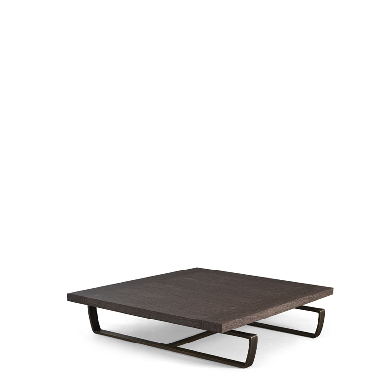 Saint Moritz is a coffee table with wooden top and bronze base, from Promemoria's catalogue | Promemoria
