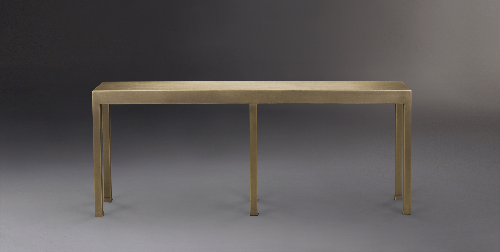 Gong is a bronze console from Promemoria's catalogue | Promemoria