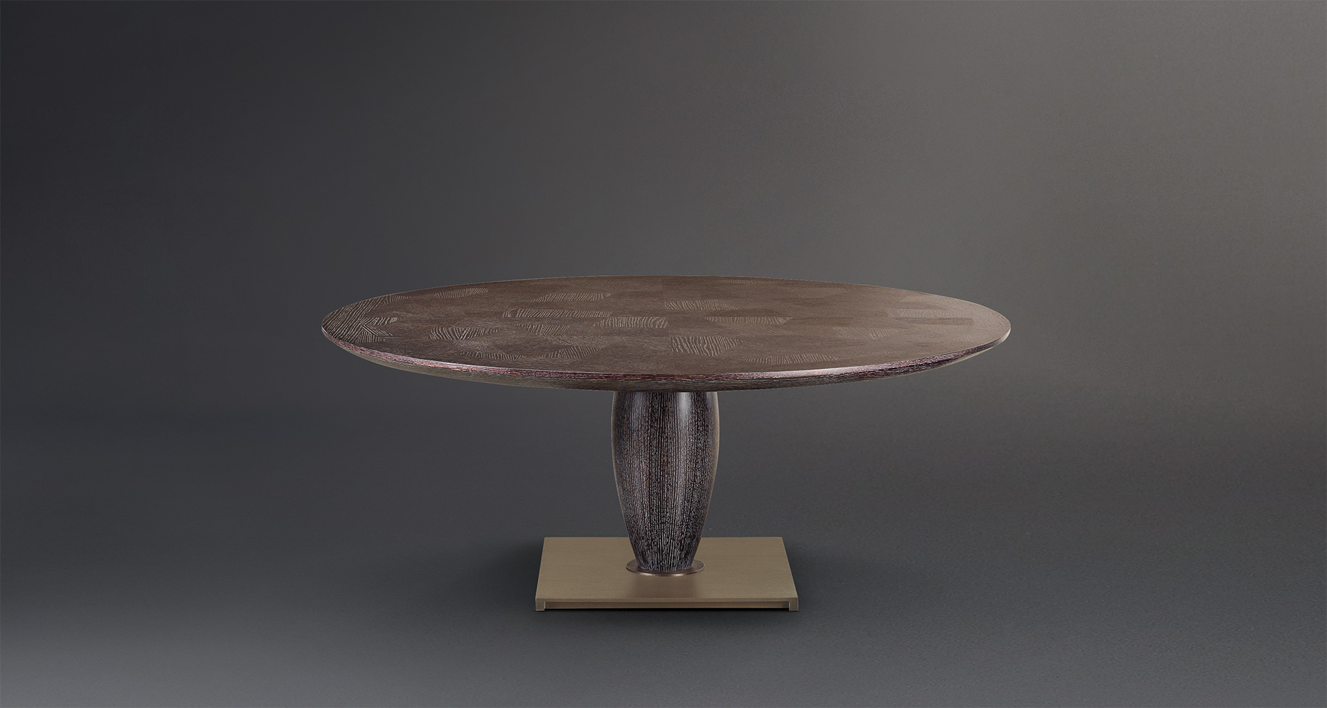 Bassano is an impressive wooden dining table with a bronze base available with inlaid top, from Promemoria's catalogue | Promemoria