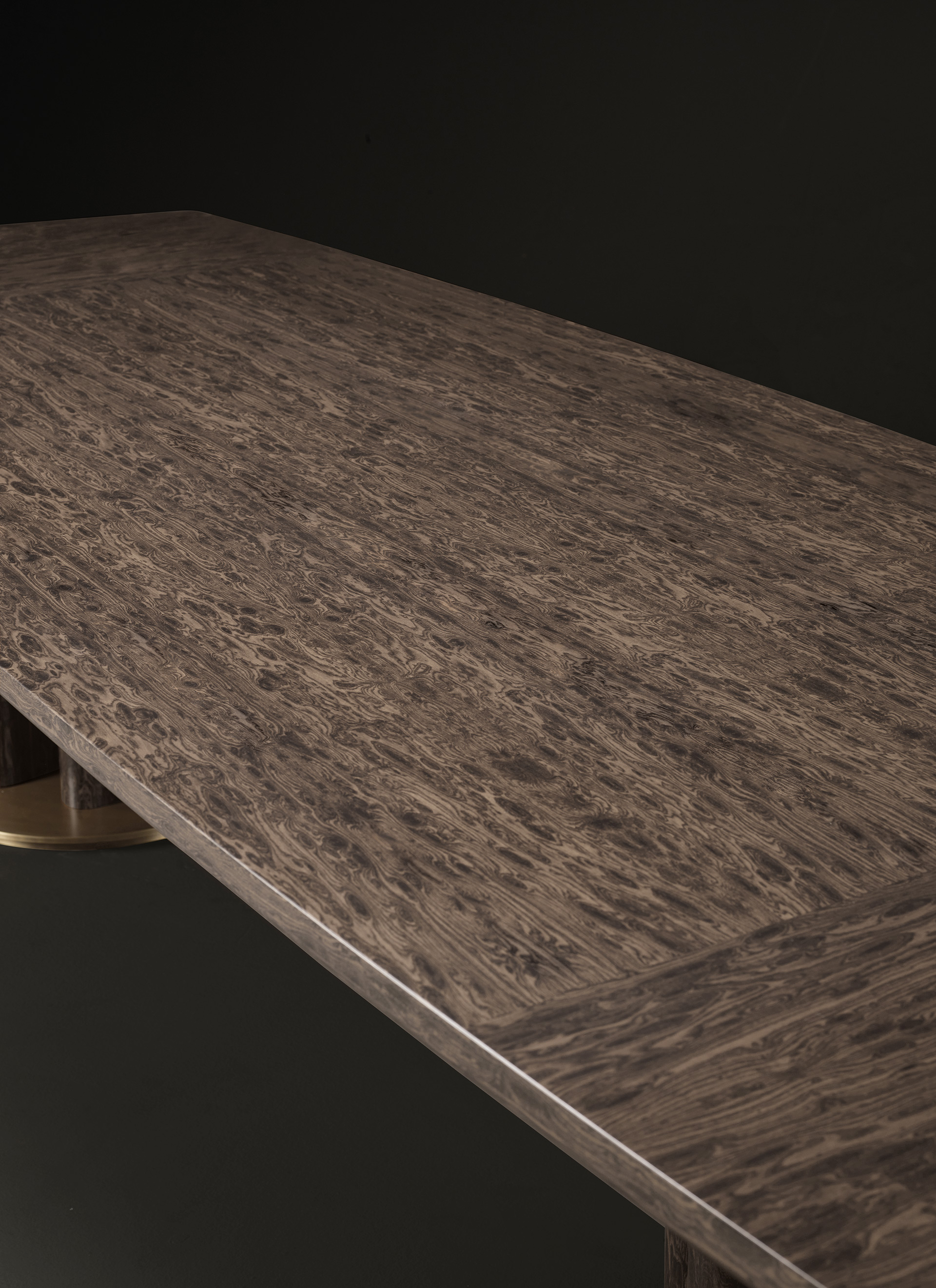 Top detail of Orazio, a wooden and bronze dining table, from Promemoria's Amaranthine Tales collection | Promemoria