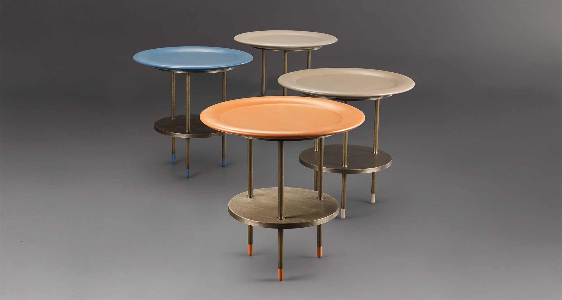Alì Babà is a bronze small table with leather tray and feet, from Promemoria's Fairy Tales collection | Promemoria